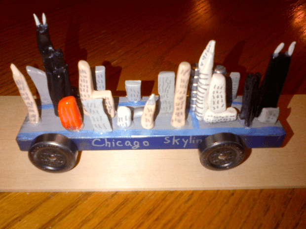 Photo of Pinewood Derby care modeled to look like the Chicago skyline.